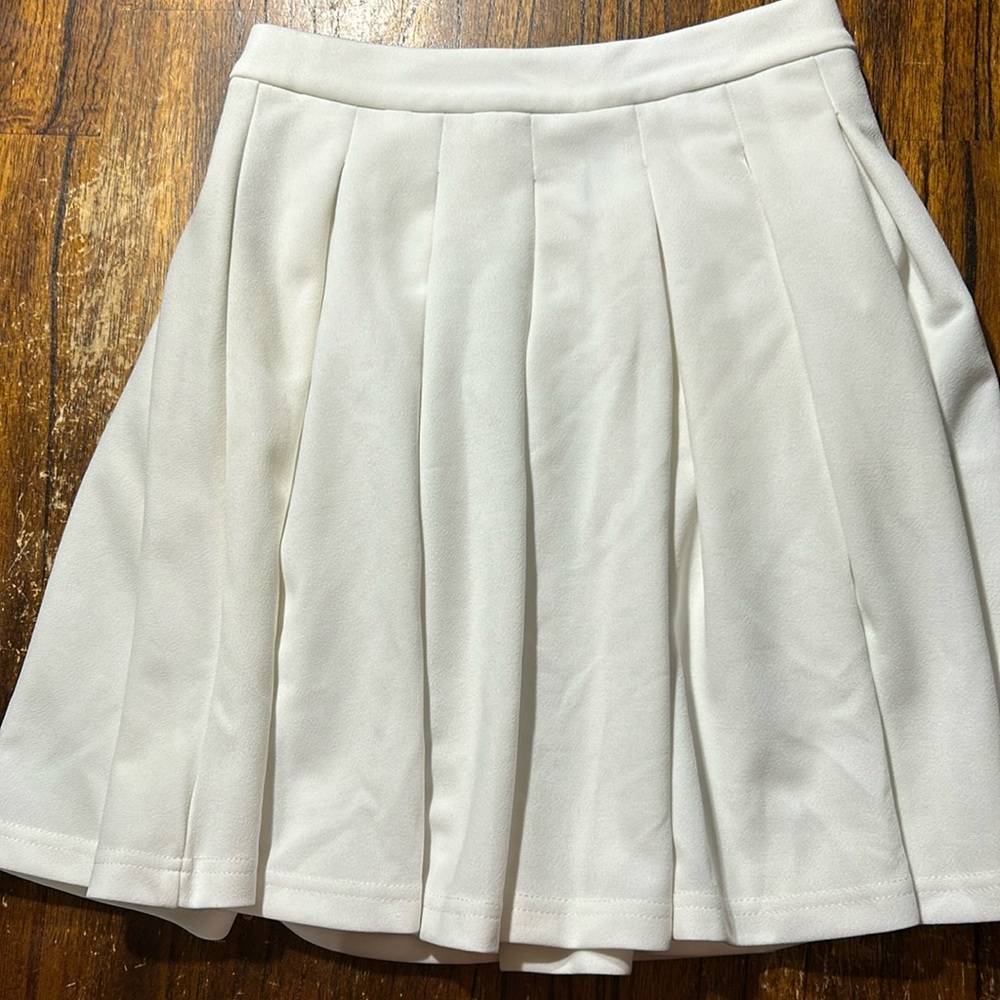 White pleated skirt